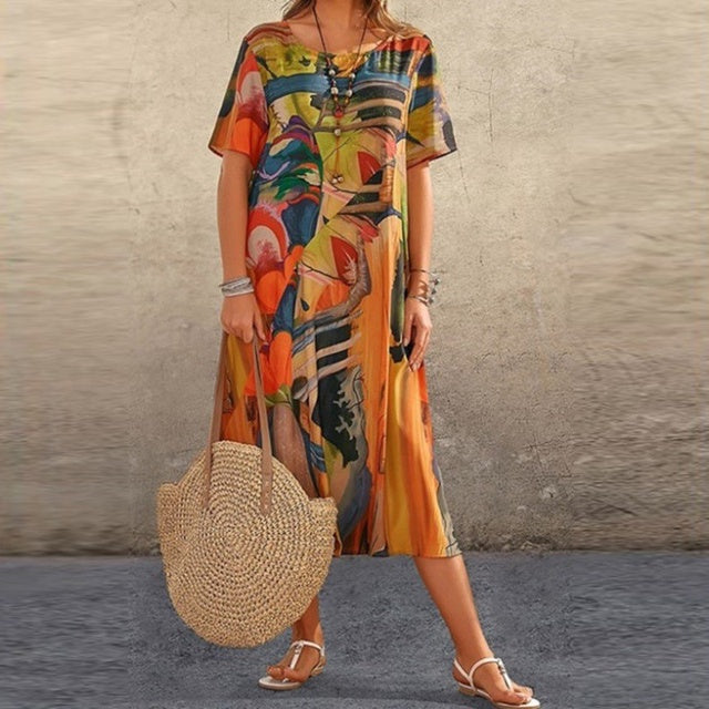 Veelzijdige dames zomerjurk met losse pasvorm, ideaal voor casual en elegante zomerse gelegenheden. Comfortabele mode.