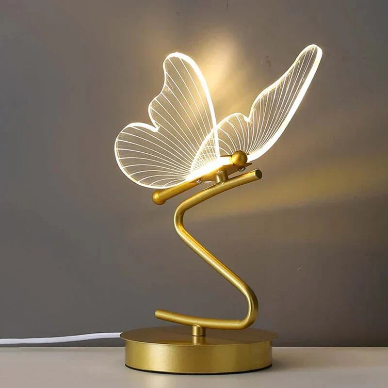 Minimalistische vlinder LED tafellamp met warm licht. Modern design en sfeervolle verlichting voor elk bureau.