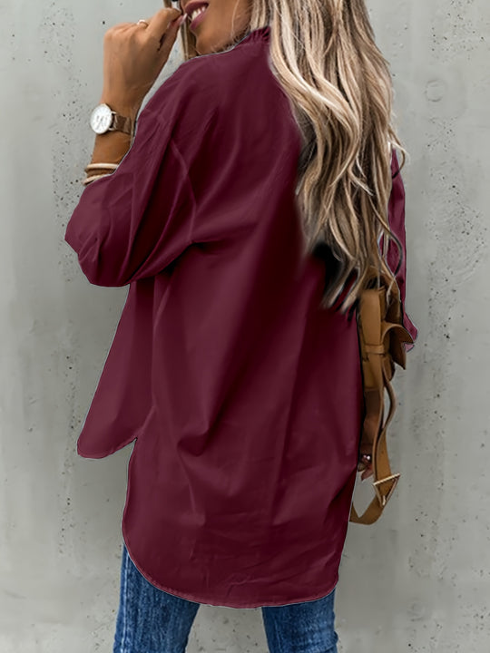 Zakelijke damesblouse Elora, een zwart overhemd met knoopjes. Professionele en elegante uitstraling.