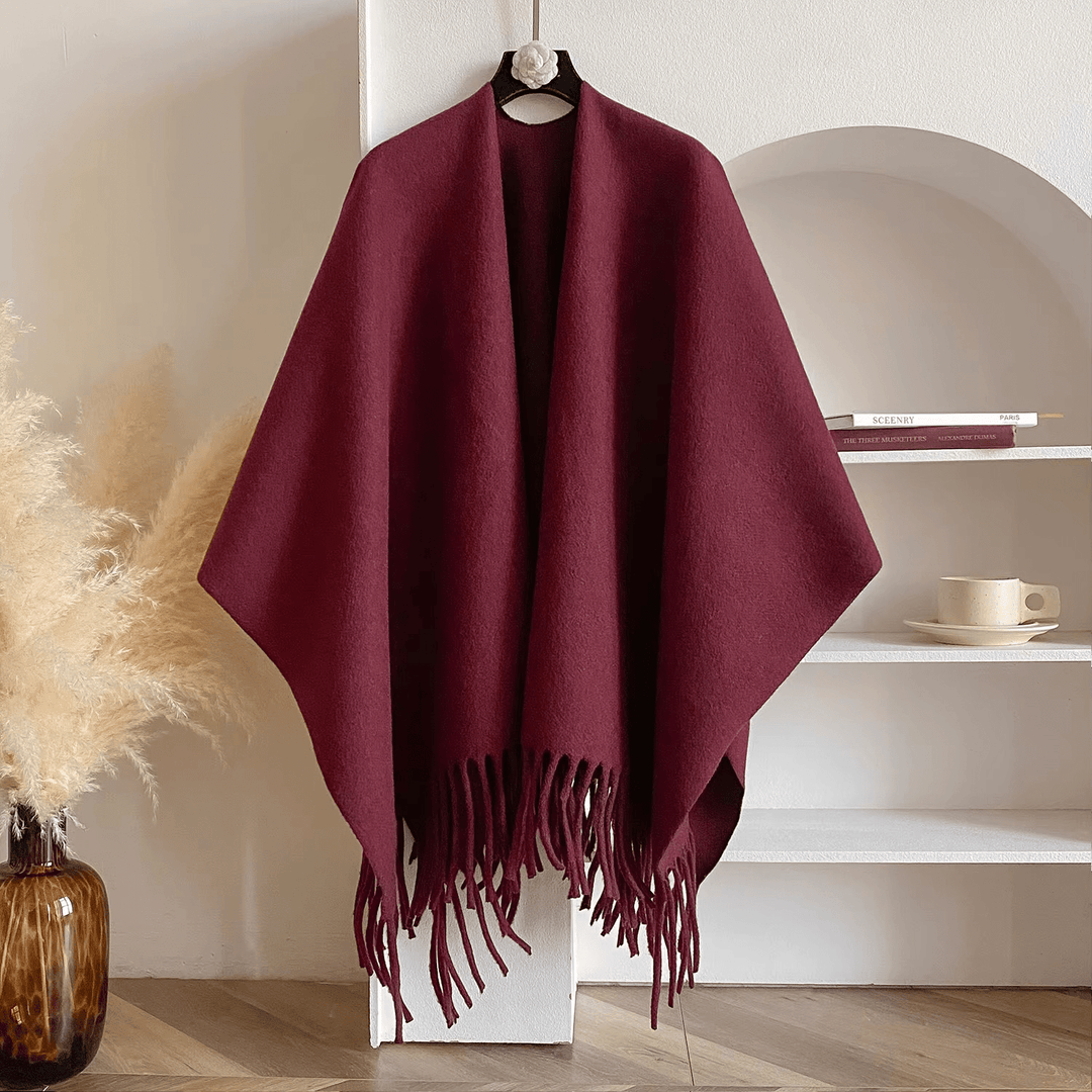 Dames poncho met dubbelzijdig patroon, stijlvol en warm. Ideaal accessoire voor comfort over een outfit.