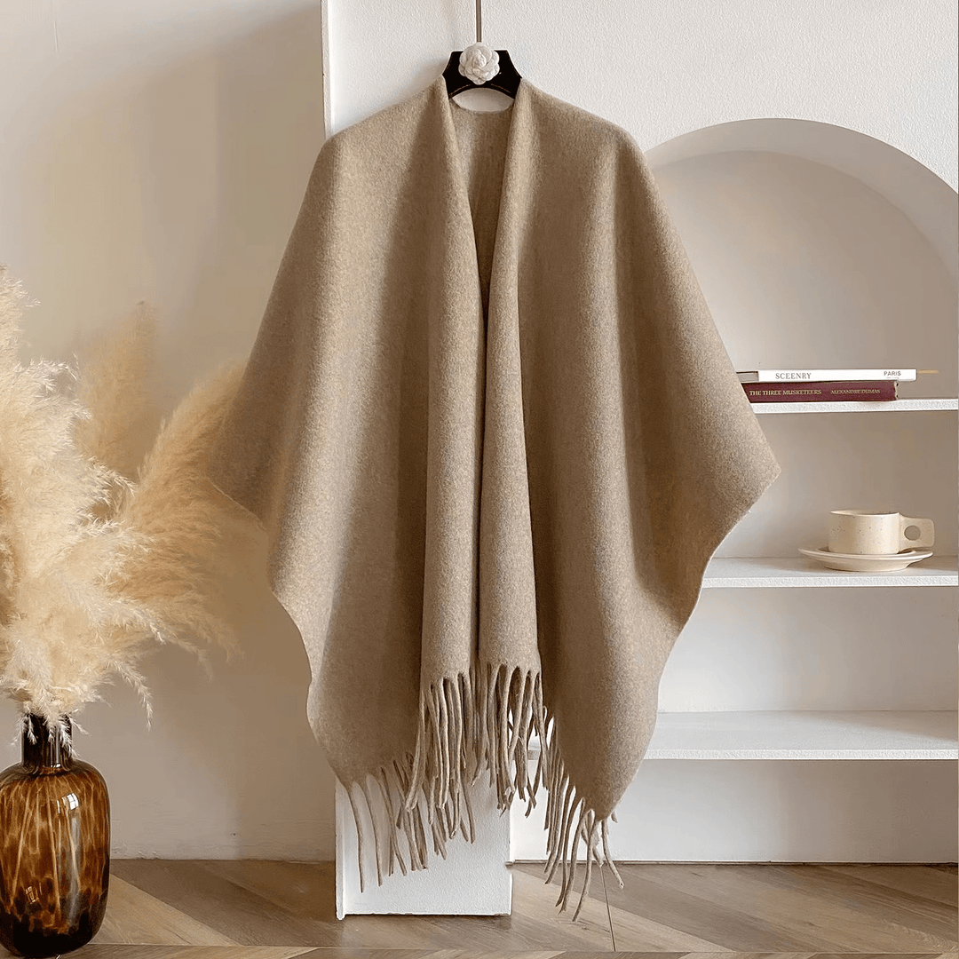 Zachte dubbelzijdige dames poncho, ultiem comfort en warmte. Perfecte fashion bovenkleding voor dagelijks gebruik.