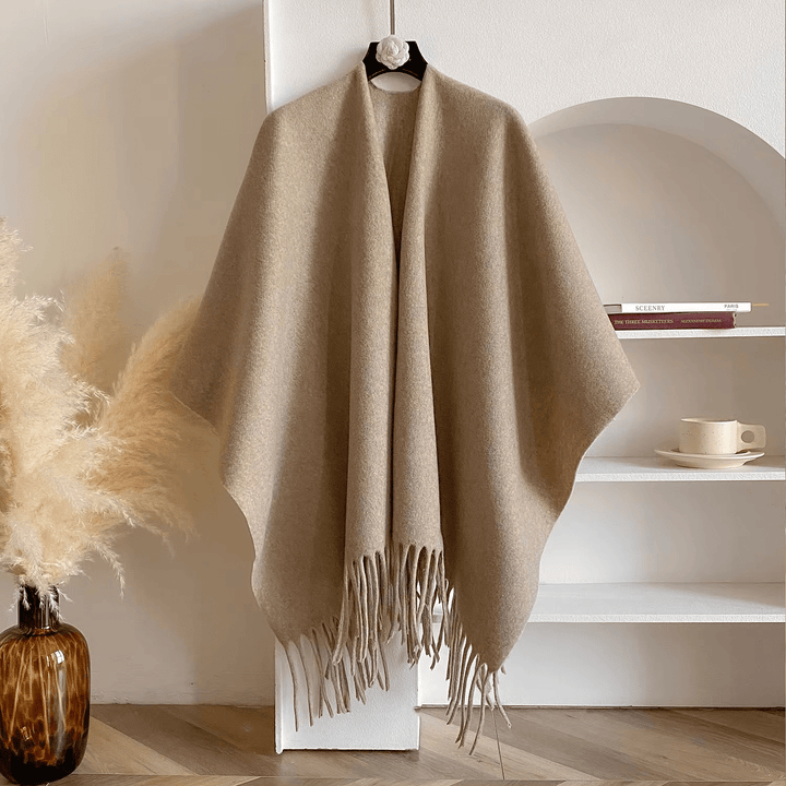 Zachte dubbelzijdige dames poncho, ultiem comfort en warmte. Perfecte fashion bovenkleding voor dagelijks gebruik.