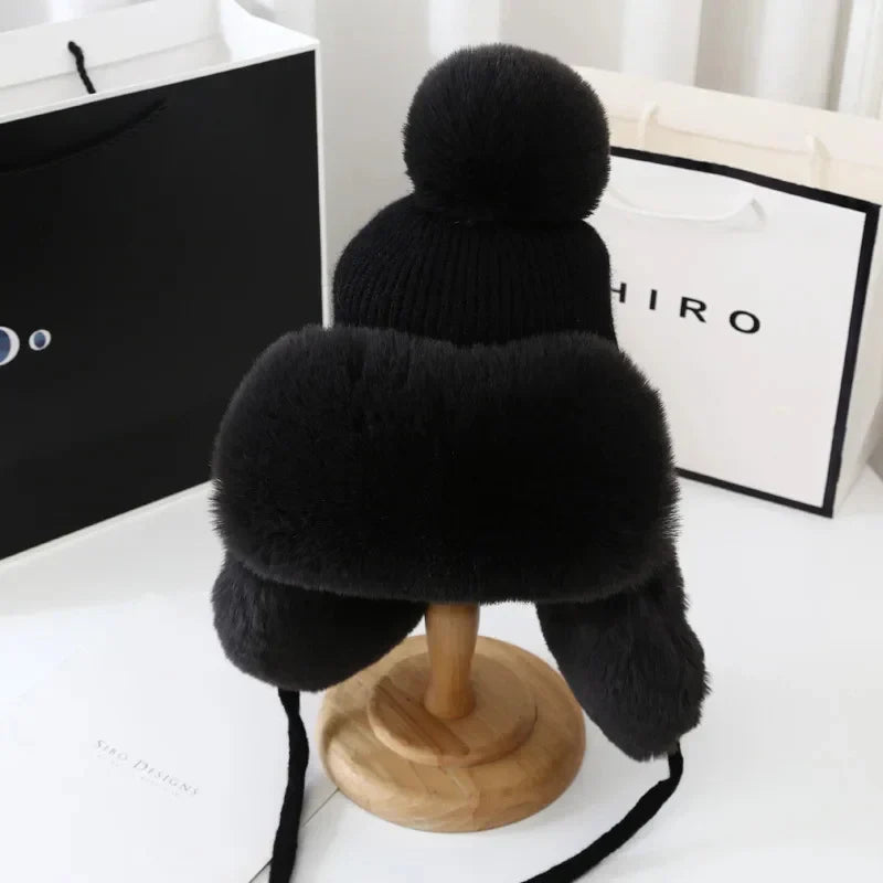 Modieuze dames wintermuts met oorflappen, stijlvol en warm voor koud weer en winteraccessoires.