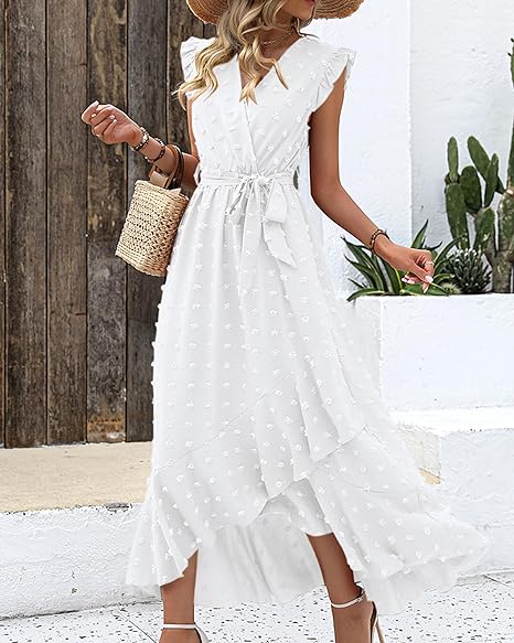 Chique dames midi jurk met elegante plooien en een speels stippen design, zeer modieus.