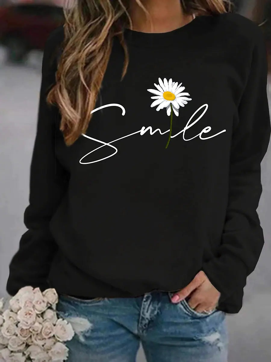 Trendy dames trui met ronde kraag en unieke 'smile' print. Perfecte comfortabele modetrui voor elke dag.