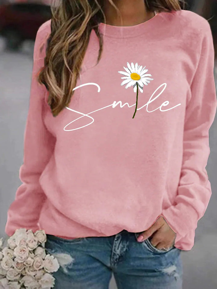 Nieuwe collectie dames trui met vrolijke 'smile' print. Een comfortabele en casual trui voor damesmode.