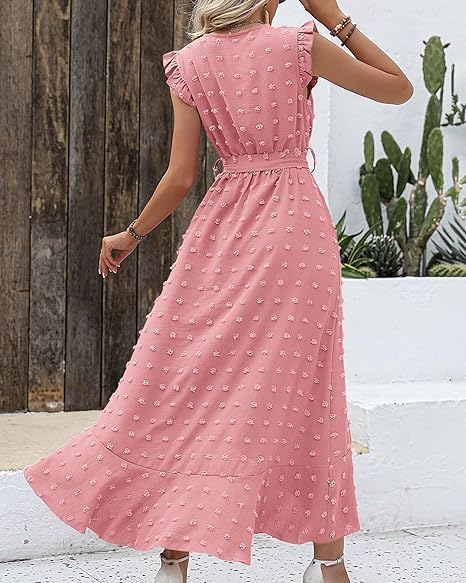 Dames elegante jurk met stippen en geplooide details, een must-have voor fashionista's.