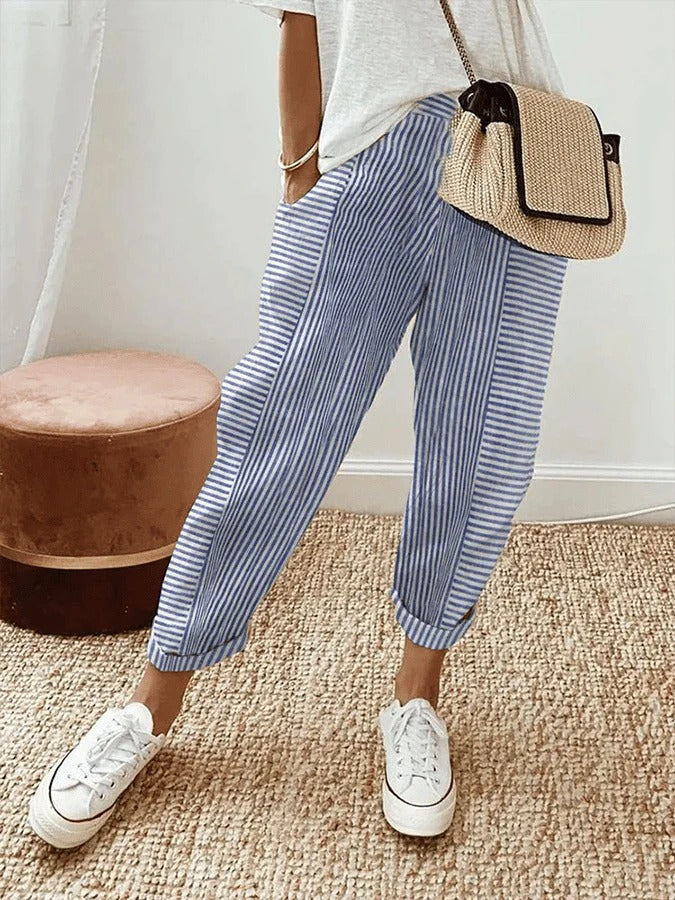 Dames gestreepte zomerbroek met hoge taille en trekkoord, ideaal voor een casual en comfortabele zomerse outfit.