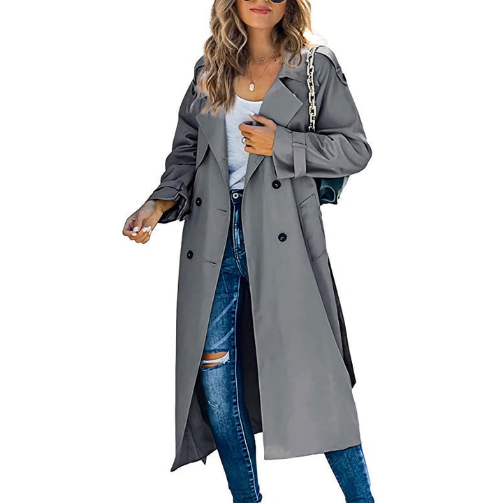 Elegante lange dames trenchcoat, getailleerd model, tijdloze mode voor een chique uitstraling.