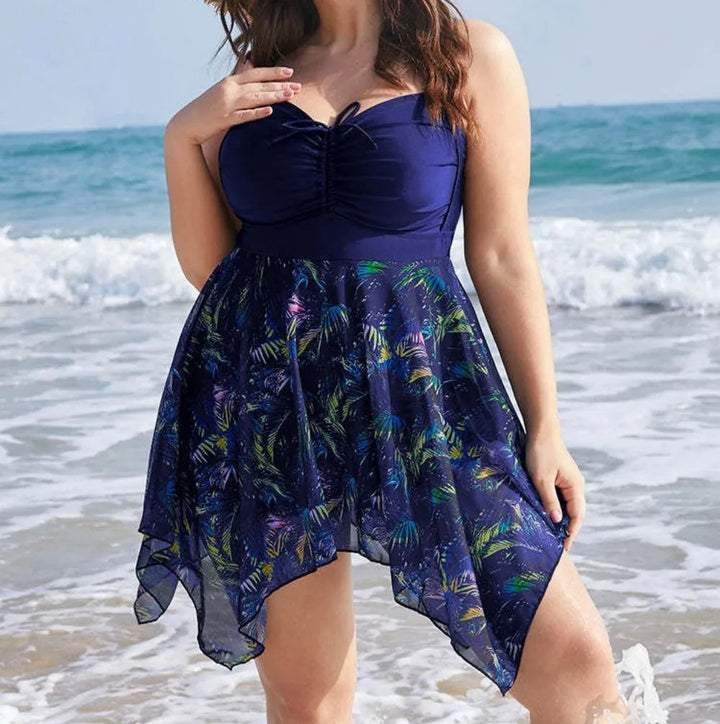 Corrigerend dames eendelig badpak met rokje, plus size zwemkleding voor een flatterende pasvorm.