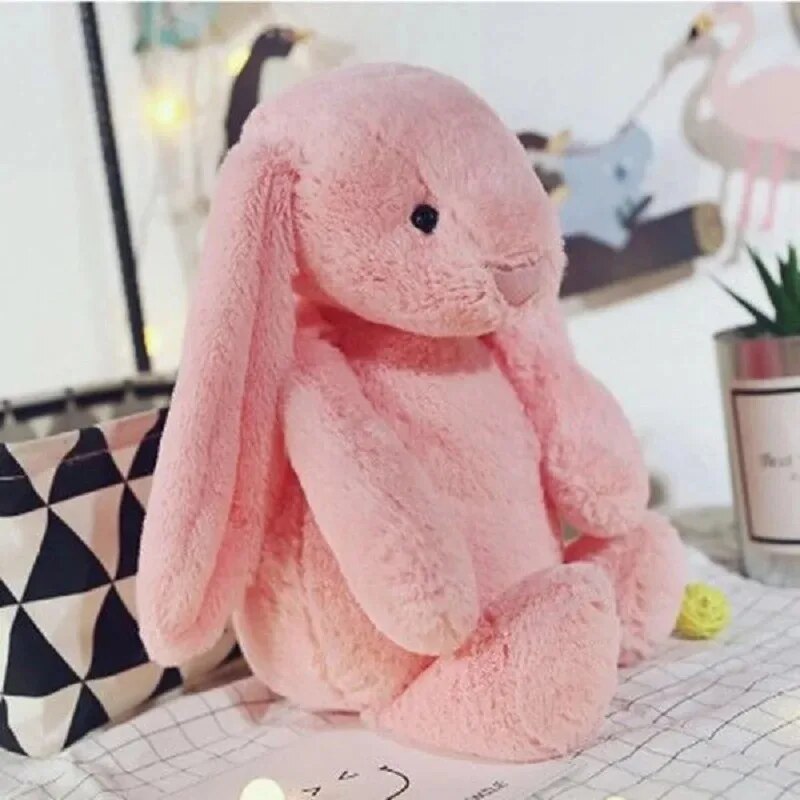 Kinderspeelgoed: een zacht pluche konijn om mee te knuffelen, het perfecte baby knuffeldier voor slaaptijd.