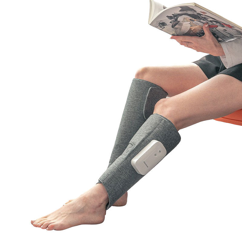 "Draadloos beenmassageapparaat met luchtcompressie, zwart, compact design, verlicht pijn en verbetert bloedcirculatie."