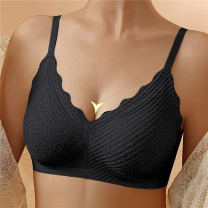"Draadloze naadloze kanten bh voor ultiem comfort en elegante look in zachtroze met verstelbare bandjes."