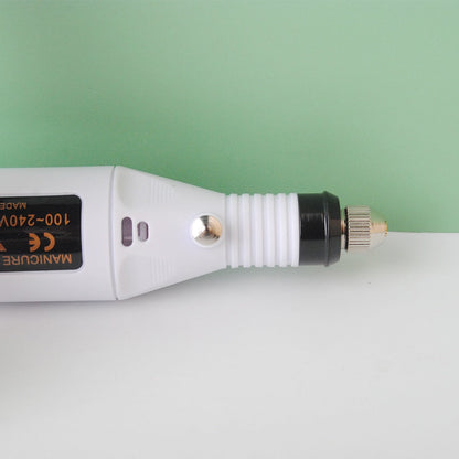 "Draagbare 6-in-1 elektrische nagelvijlset voor manicure en pedicure, inclusief 6 opzetstukjes, roze uitvoering."