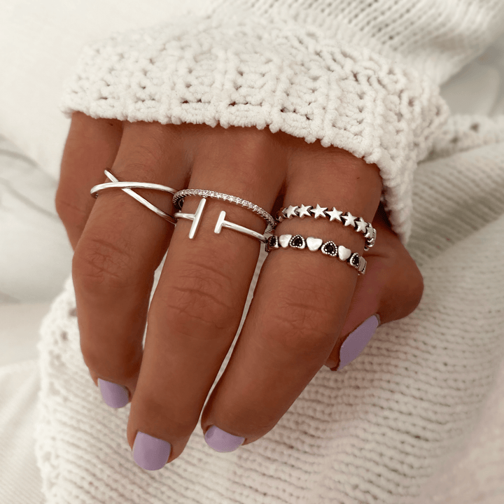Trendy zilver-goud dubbel kruisring voor dames. Modern en elegant sieraad; Calindra fashion ring.
