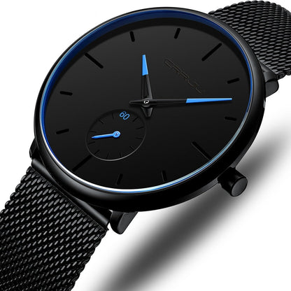 "Dun minimalistisch herenhorloge met elegante zwarte wijzerplaat, roestvrijstalen mesh-band en luxe uitstraling."