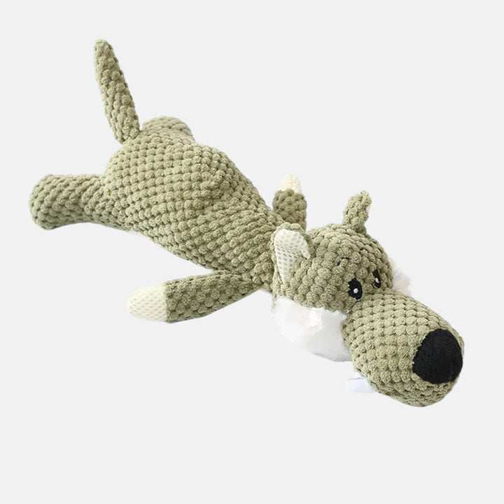 Hond genietend van zijn duurzame kauwspeeltje, een essentieel dierbenodigdheden voor gebitsverzorging.