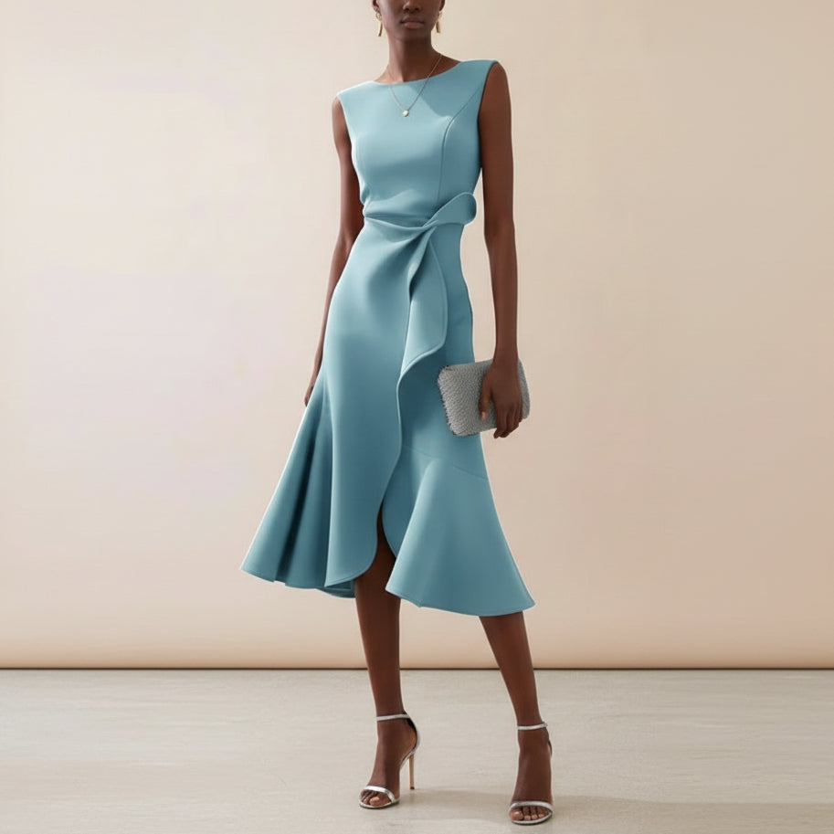 Mouwloze zomer midi-jurk voor dames. Perfect als casual vakantie jurk of elegante feestjurk met trendy strik.