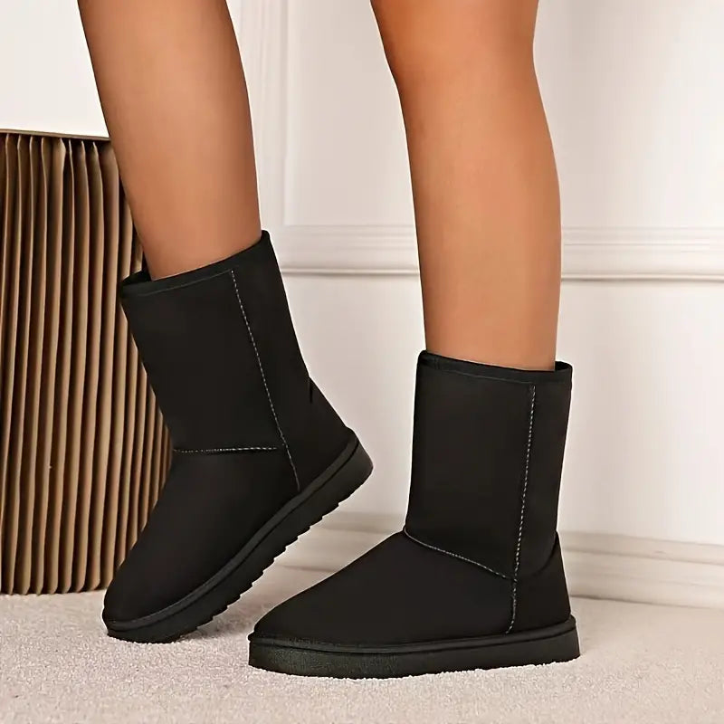 Unisex Aria slip-on winterlaarzen met warme fleecevoering en antislipzool, ideaal voor koud weer.