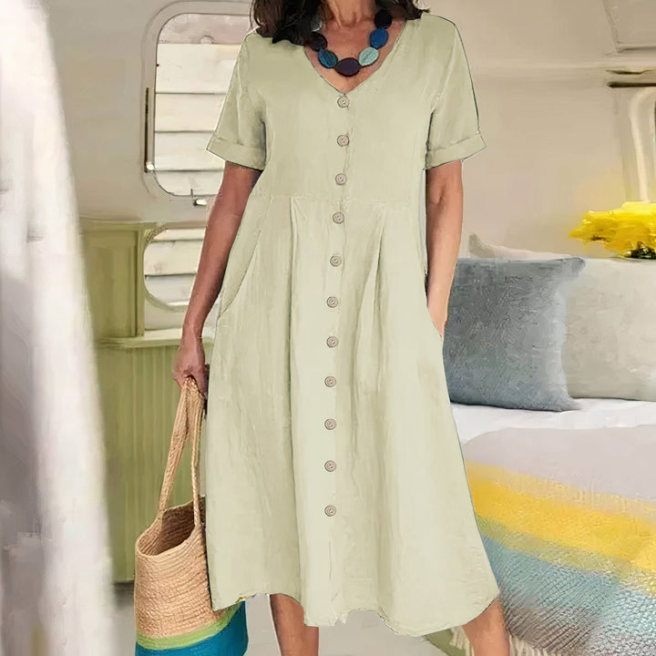 Stijlvolle katoen-linnen dames zomerjurk, losvallend model en ademend voor een frisse look.
