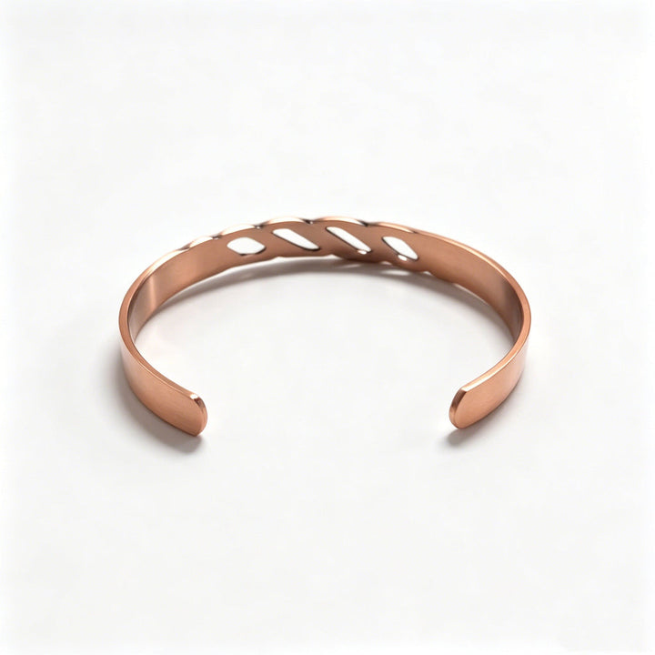 Dames sieraad: koperen armband met sprankelende paarse zirkonia en het tijdloze oneindigheidsteken.