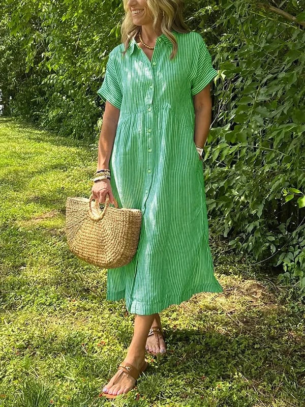 Elegante dames gestreepte blousejurk, gestyled voor een chique look, ideaal voor kantoor of diner.