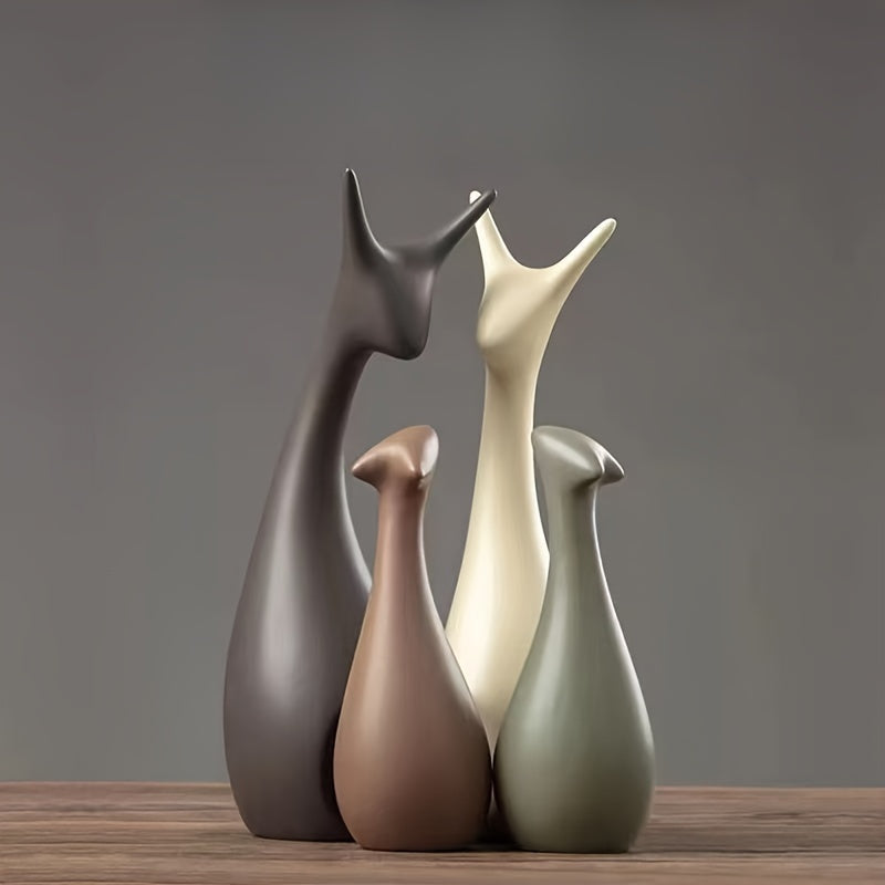 Set van twee keramische herten beelden; verfijnde kantoor decoratie of luxe interieur element.