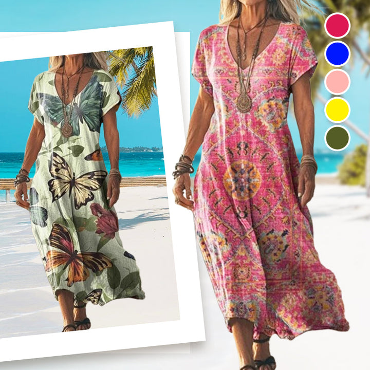 Zomerse dames maxi jurk met vlinderprint, elegant en luchtig. Ideaal voor een casual dag of een avondje uit.