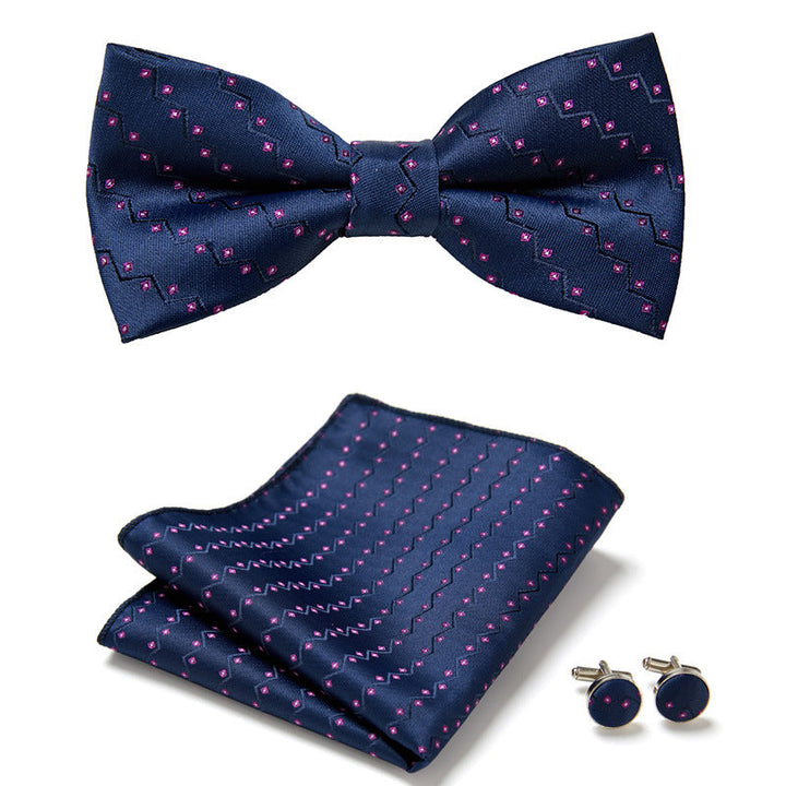 Complete heren accessoire set: vlinderstrik, pochet en manchetknopen met uniek bloemendesign. Formeel & chique.