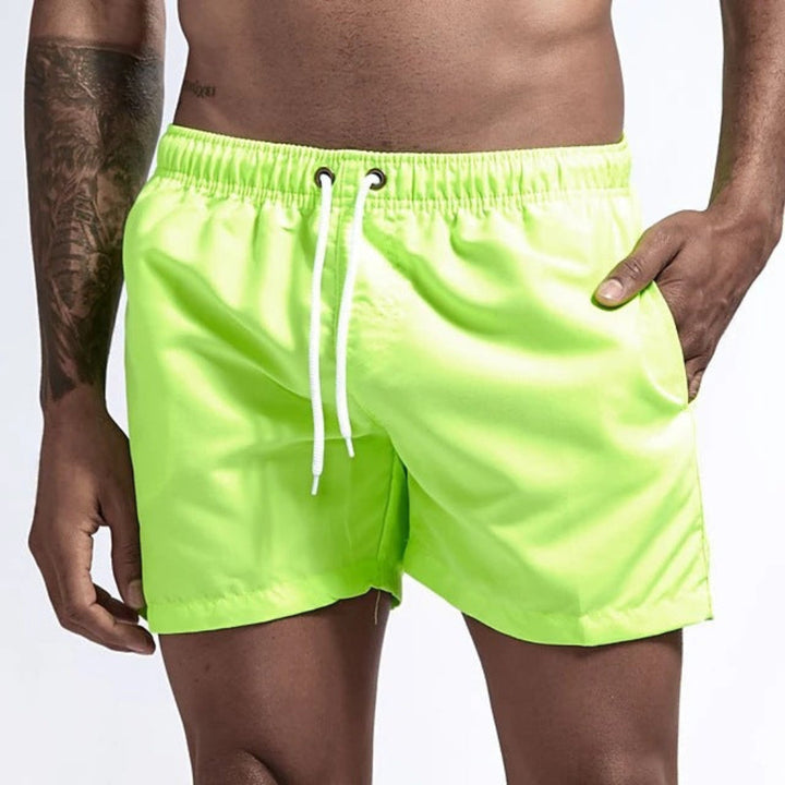 Collectie heren zomer strandshorts, diverse pastelkleuren voor een frisse en comfortabele look.