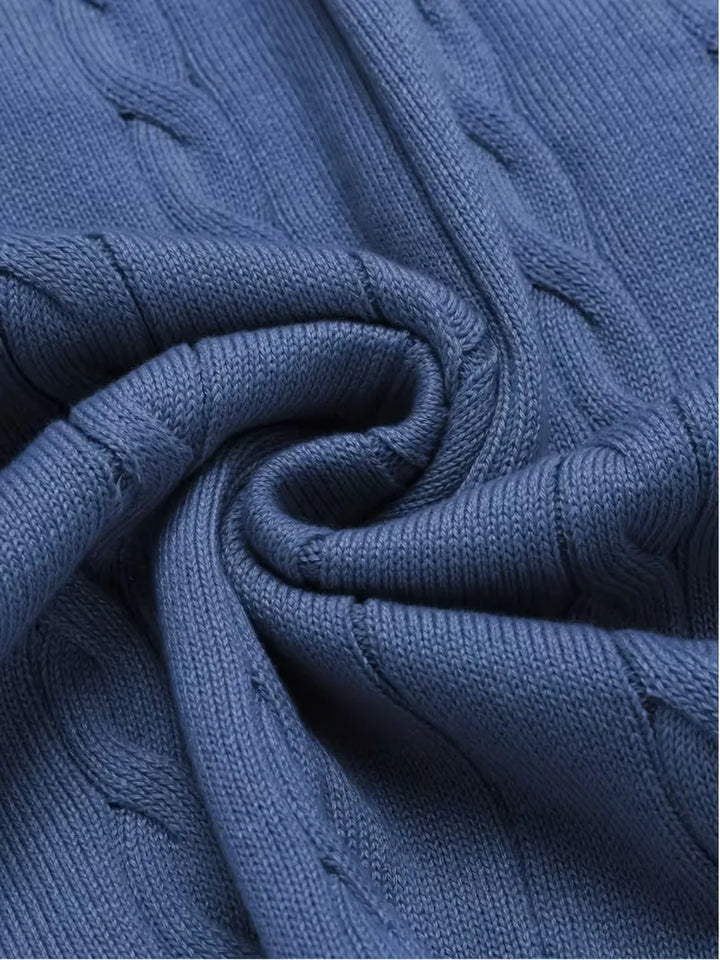 Heren herfstmode: comfortabel mouwloos vest met elegante V-hals en uniek kabelpatroon.