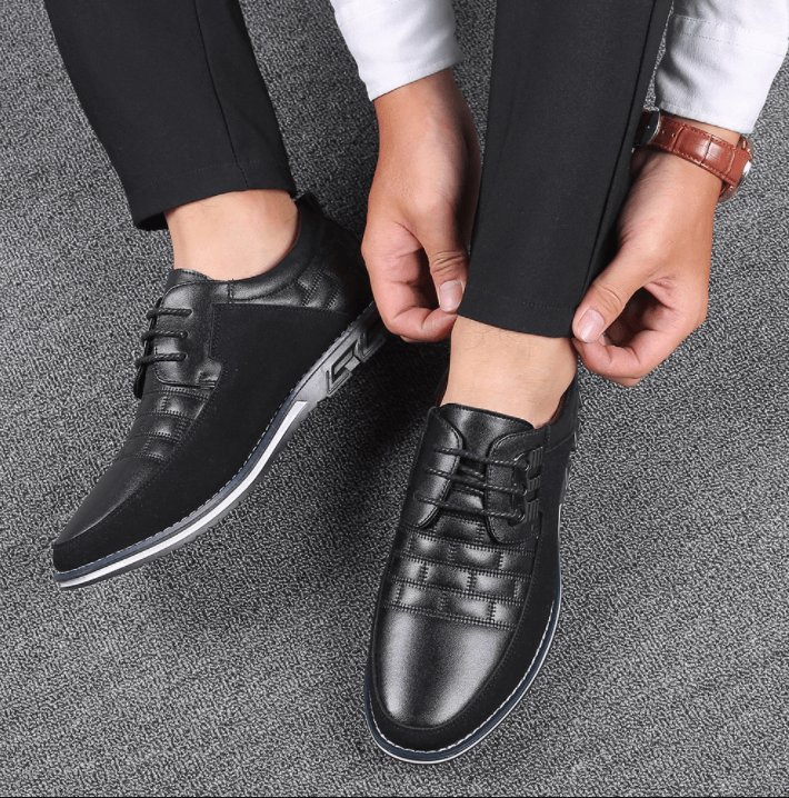 Zijaanzicht van de elegante heren hybride schoenen in duurzaam kunstleer.