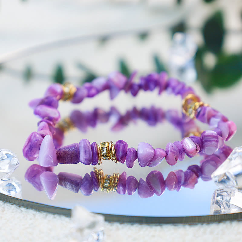 Trendy modeaccessoire: Celine dames armband met spirituele natuursteen kralen.