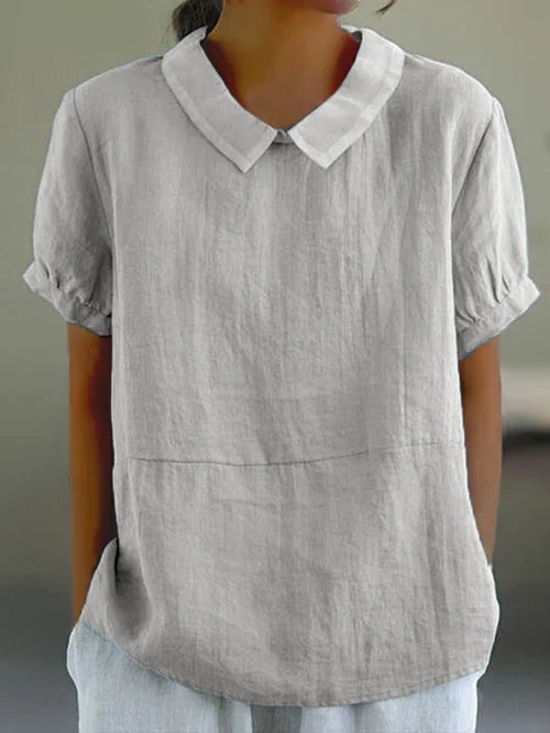 Dames top met relaxte pasvorm in een effen kleur, perfect voor een casual zomerlook. Modieuze en ademende stof.