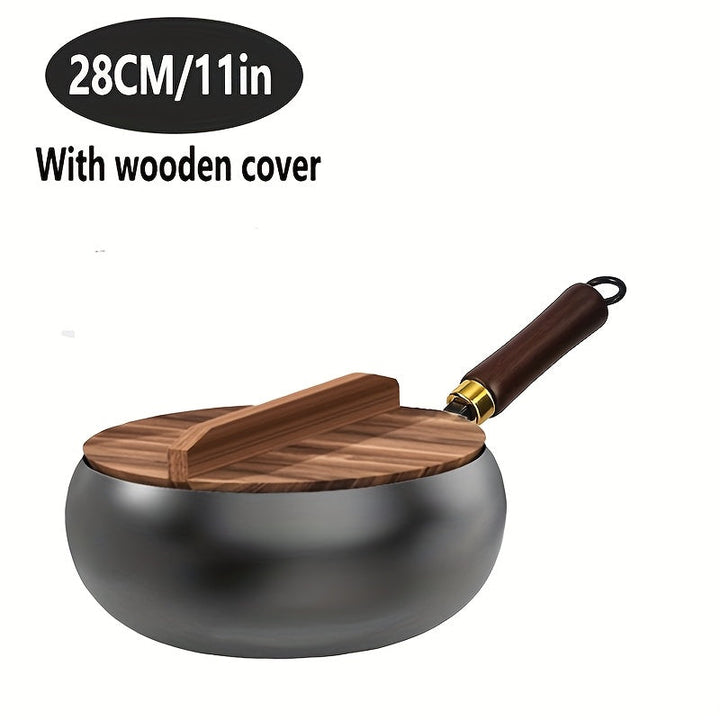 Stijlvolle zwarte ChefMaster gietijzeren braadpan met handvatten, veelzijdig voor de keuken.
