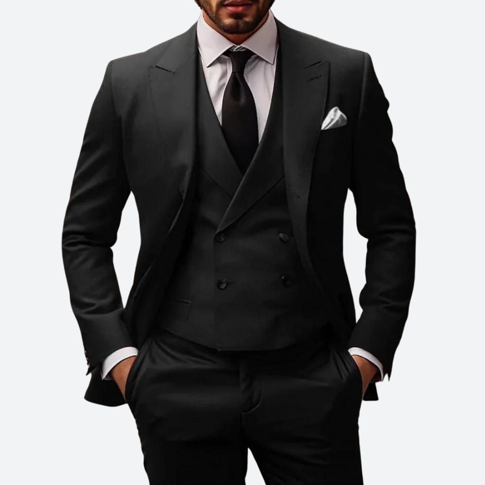 "Elegant 3-delig herenpak, modern fit, met colbert, broek en vest. Perfect voor zakelijke of speciale gelegenheden."