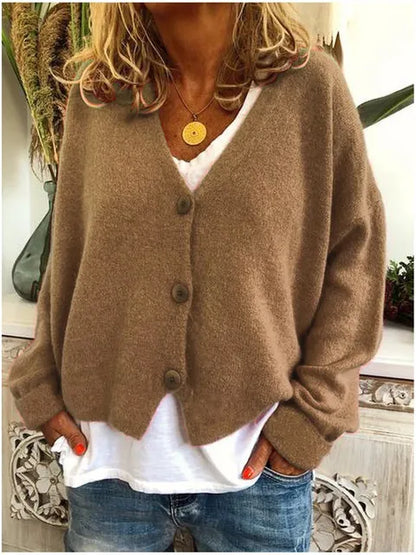 "Elegant katoenen dames vest met knopen, tijdloze stijl, zacht textuur, lange mouwen, perfect voor elke gelegenheid."