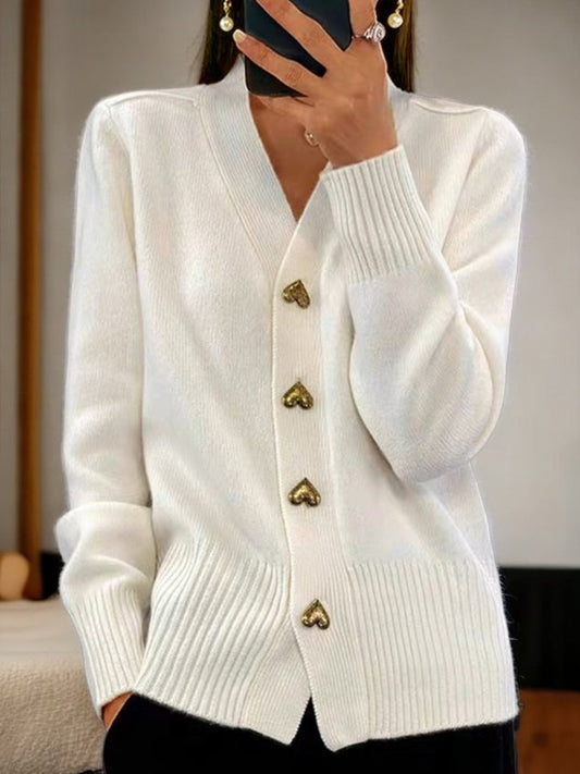 "Elegant, klassiek damesvest met V-hals in effen design. Perfect voor casual en formele stijlen, warm en comfortabel."