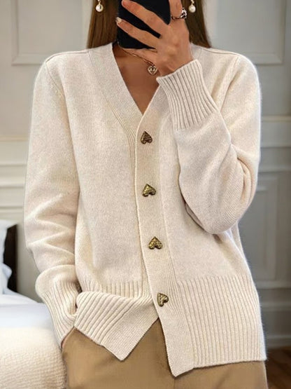"Elegant, klassiek damesvest met V-hals in effen design. Perfect voor casual en formele stijlen, warm en comfortabel."