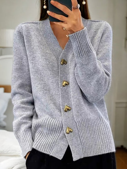 "Elegant, klassiek damesvest met V-hals in effen design. Perfect voor casual en formele stijlen, warm en comfortabel."