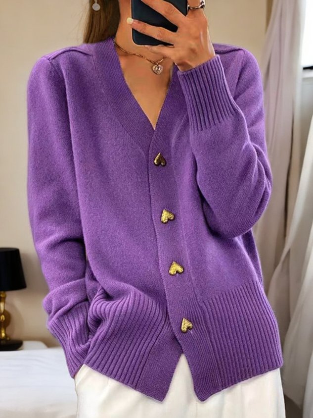 "Elegant, klassiek damesvest met V-hals in effen design. Perfect voor casual en formele stijlen, warm en comfortabel."