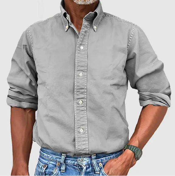 "Elegant klassiek Levi overhemd voor mannen, blauw katoenen stof, geschikt voor zowel zakelijke als informele gelegenheden."