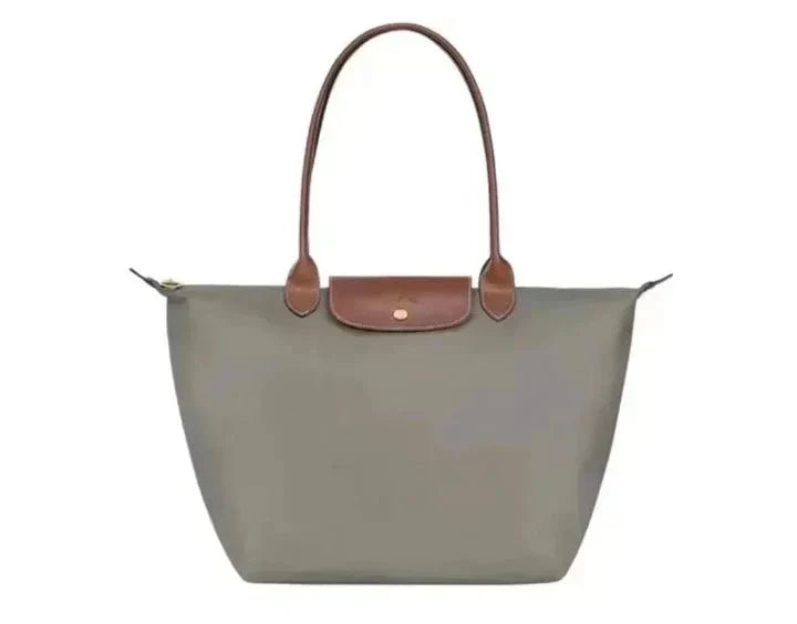Dames schoudertas met verstelbare riem, perfect om over de schouder te dragen; een modieus en praktisch accessoire.