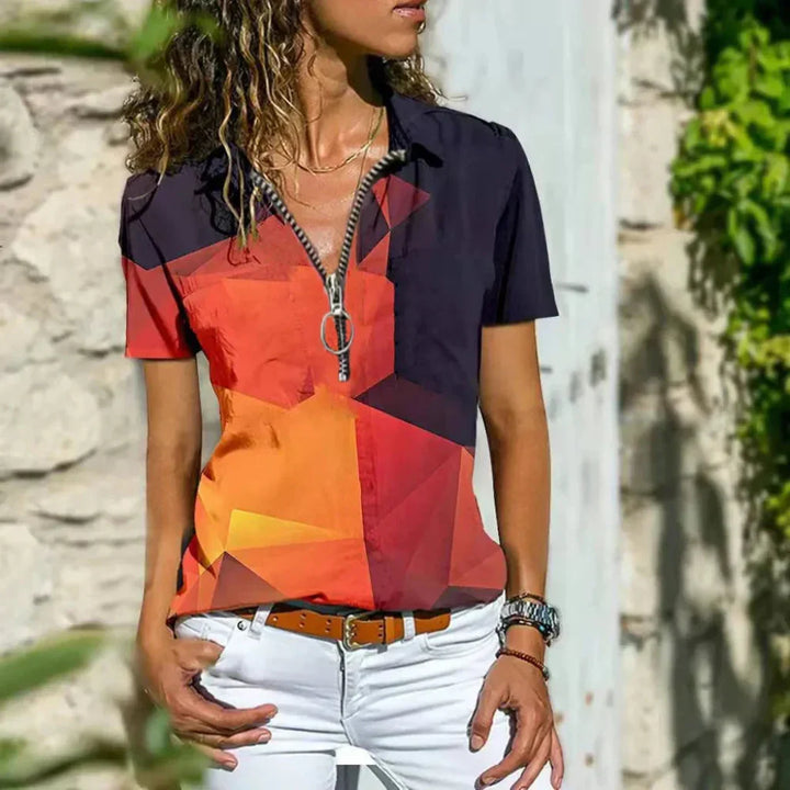 Comfortabel dames zomershirt in oranje, met modern en stijlvol design. Ideaal voor lente en zomer casual outfits.