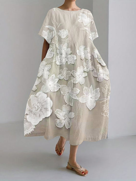 "Elegante bloemenjurk met relaxed fit, subtiele bloemenprint en luchtig ademend materiaal voor comfortabele casual stijl."