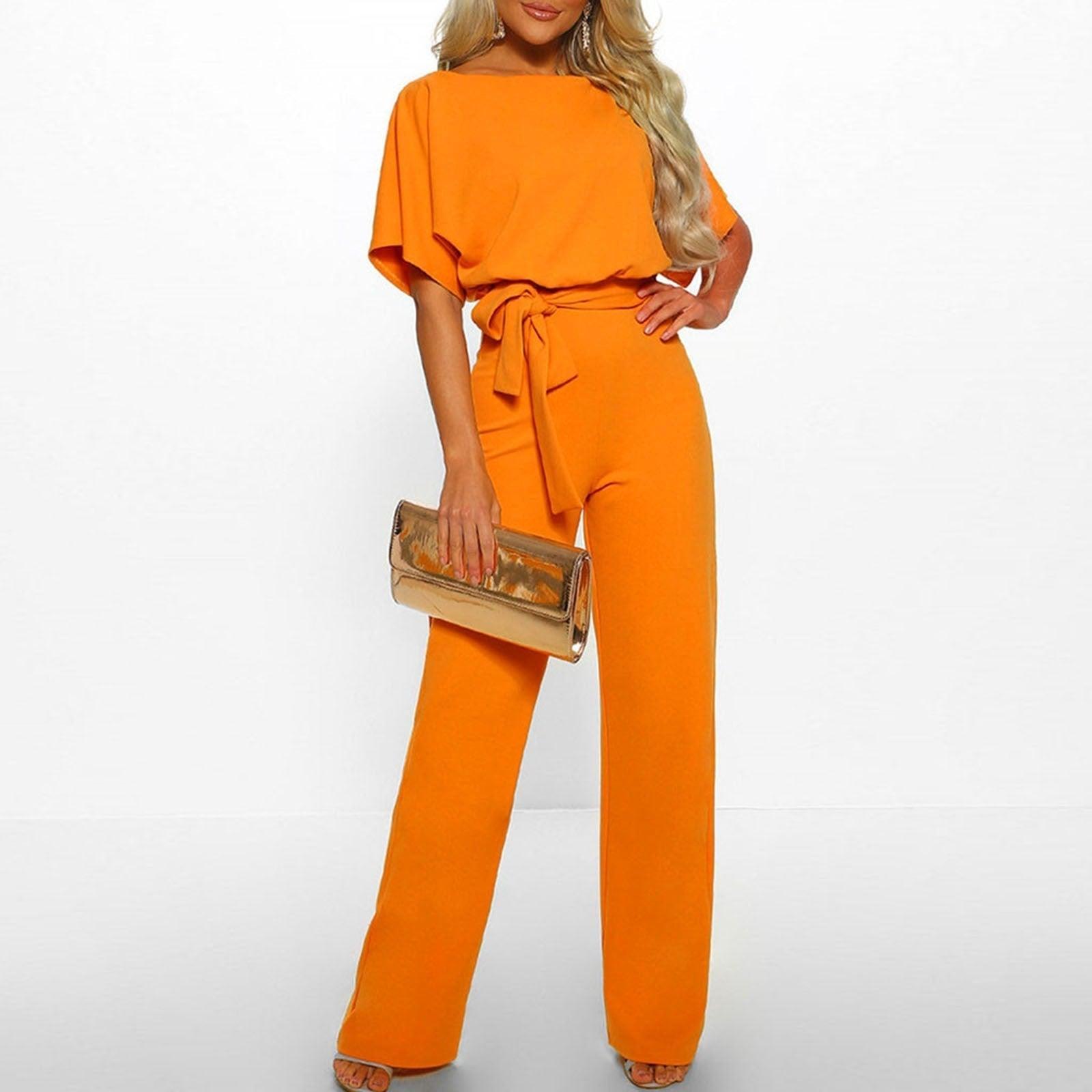 "Elegante dames jumpsuit met brede pijpen, korte mouwen en riem, ideaal voor zowel formele als casual gelegenheden."