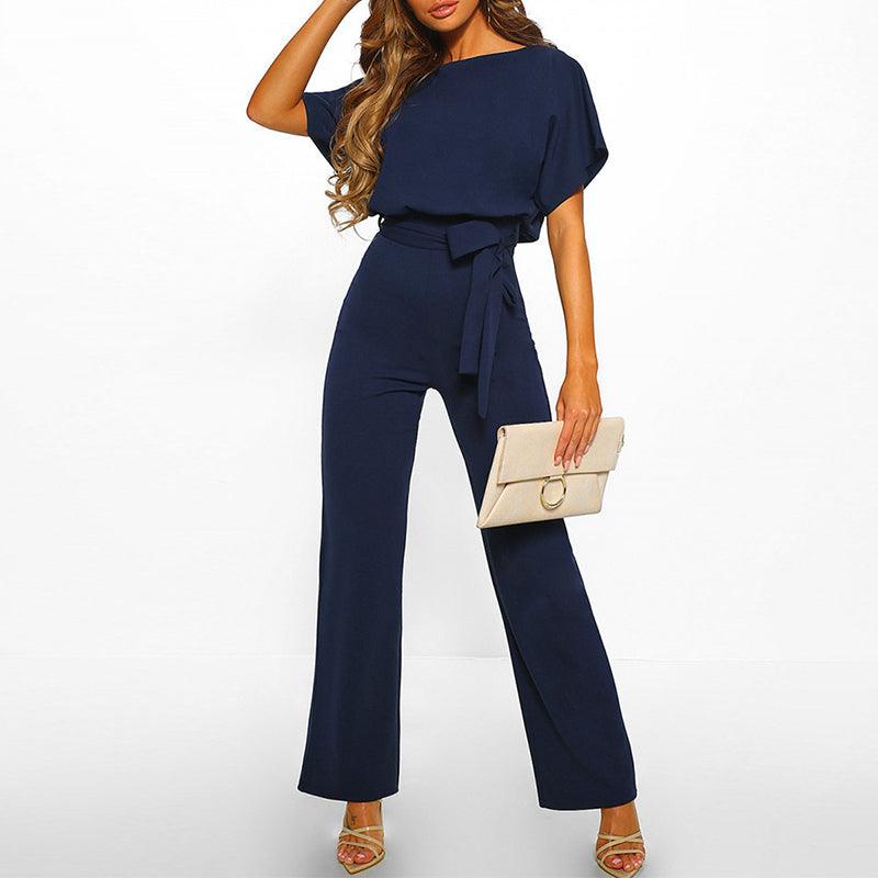 "Elegante dames jumpsuit met brede pijpen, korte mouwen en riem, ideaal voor zowel formele als casual gelegenheden."