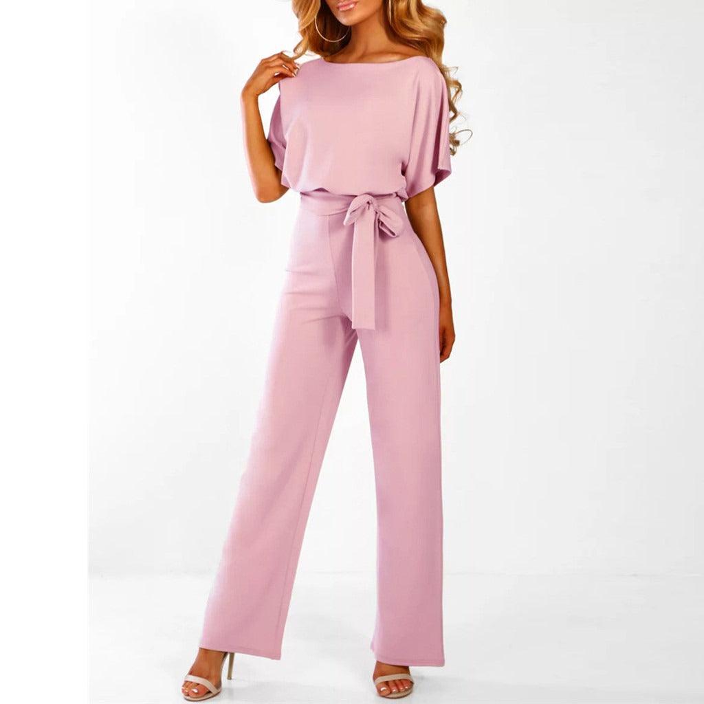 "Elegante dames jumpsuit met brede pijpen, korte mouwen en riem, ideaal voor zowel formele als casual gelegenheden."