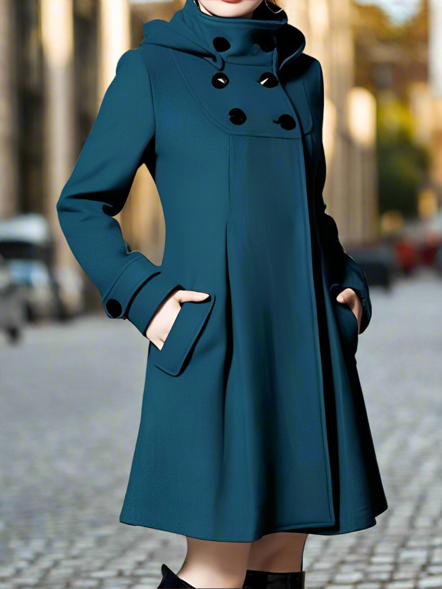 Elegante dames wollen winterjas, warm en stijlvol, met praktische zijzakken en tijdloze snit. Perfect voor koude maanden.