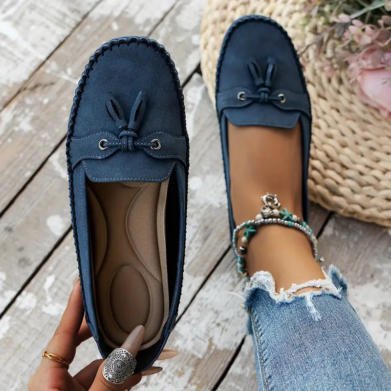 Stijlvolle roze dames instappers, klassieke mocassins, comfortabel en modieus.